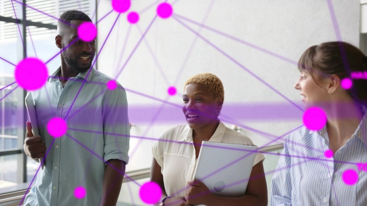 Three colleagues walking, discussing business while magenta nodes forming network, overlaying faces