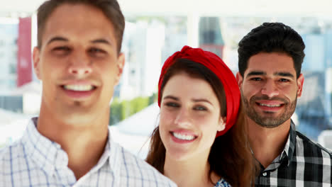 Team-of-executives-standing-together-in-the-office-4k