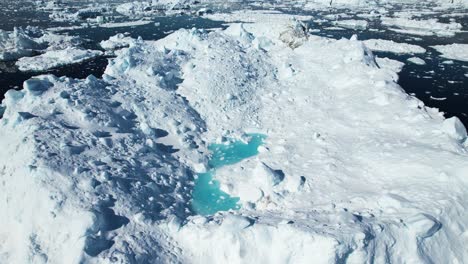 glaciers and deep ocean near greenland, aerial view