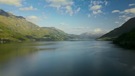 drone flies over the fjords of norway in fine weather