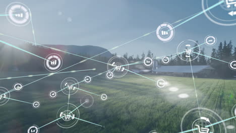 animation of digital network icons overlaying green field with trees and mountains