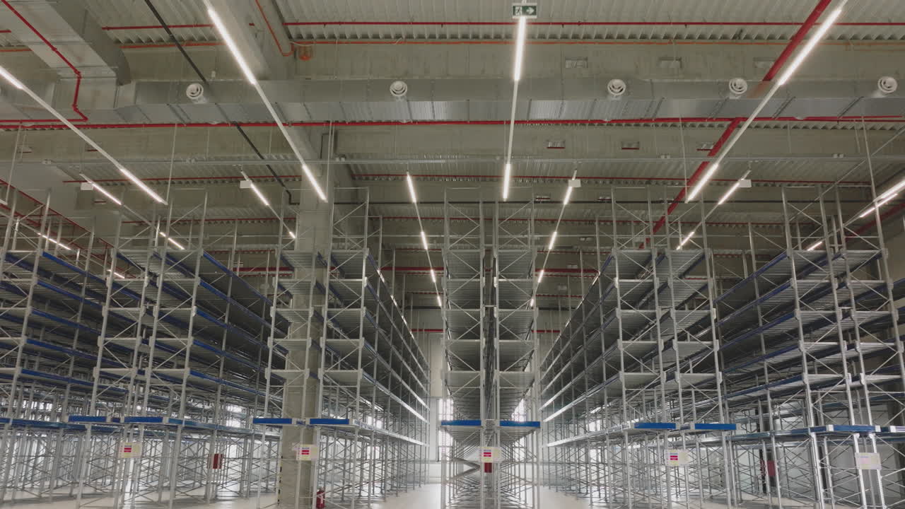 Empty Modern Warehouse Interior with Metal Shelving