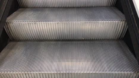 closeup of vacant escalator ride in 4k