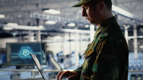 army software developer in server hub uses artificial intelligence app on laptop