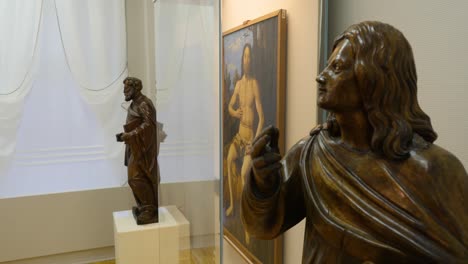 religious statues and painting in a museum