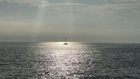 light shimmers on the atlantic ocean in the late afternoon near sea point, cape town.