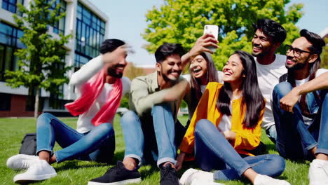happy multi-ethnic students taking a selfie on campus