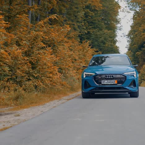 new all-electric audi e-tron. presentation of the new audi electric car on road
