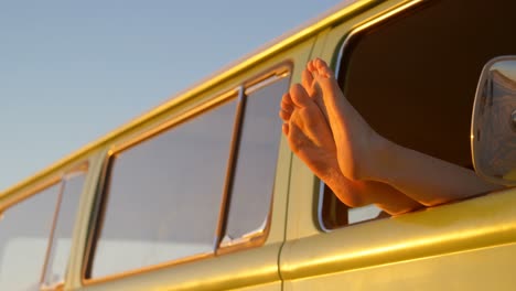 woman legs out of the van window 4k