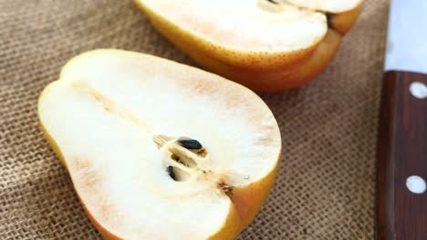 sliced pears on burlap