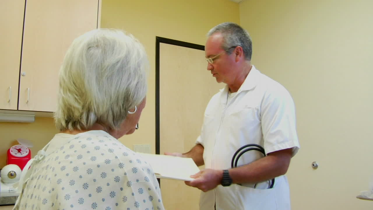 A doctor uses a stethoscope to listen to a patient's heart and lungs