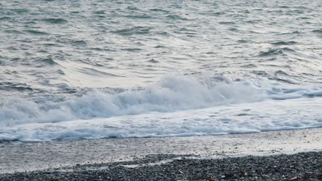 sea or ocean, waves close-up view. blue waves sea water. blue crystal clear water. one can see the sandy seabed. sea wave low angle view