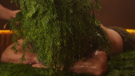 traditional pine branch body treatment