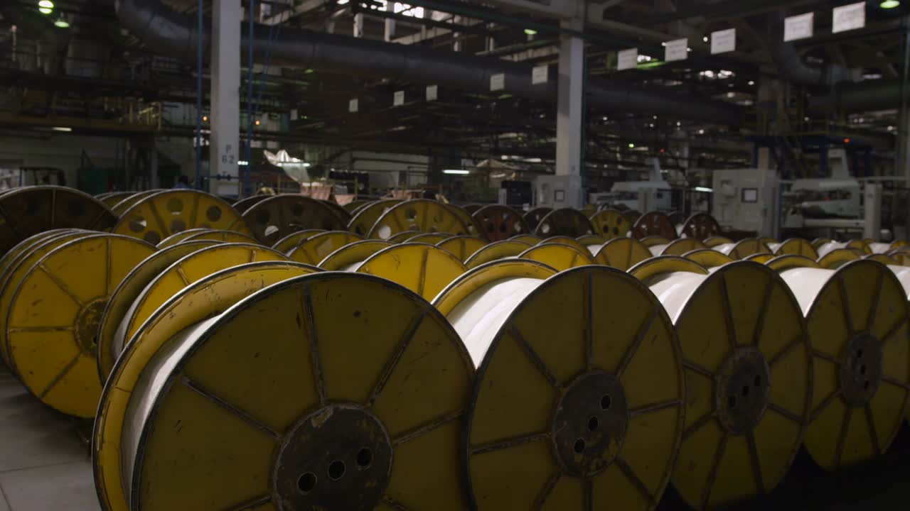Rubber Tire Thread Coins Lay on Floor in Warehouse