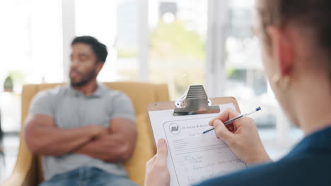 Man,-psychologist-and-writing-on-clipboard