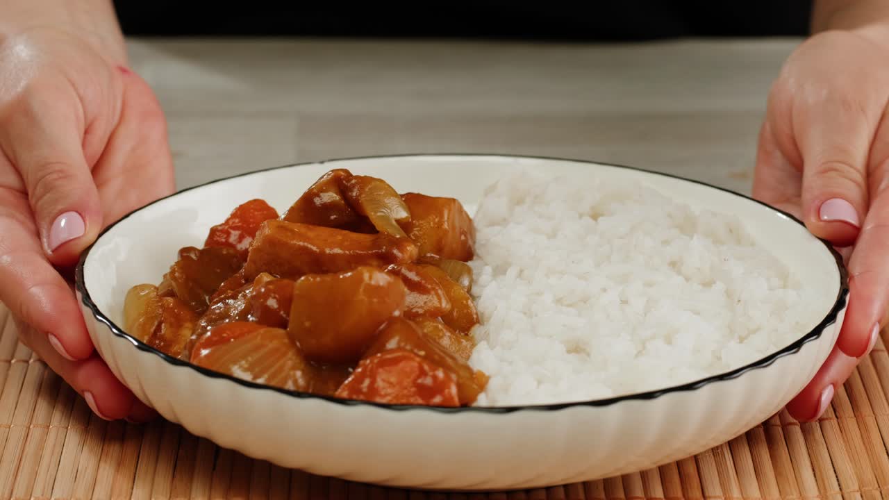 Japanese curry rice with fry pork Tonkatsu, Katsu Kare, Japanese breaded cooking dinner in restaurant, close up macro of asian food