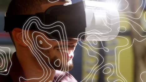 animation of white lines over mixed race man wearing vr headset