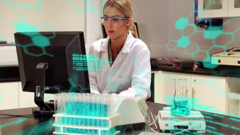 Animation-of-chemical-formulas-and-data-processing-over-caucasian-female-lab-worker-using-computer