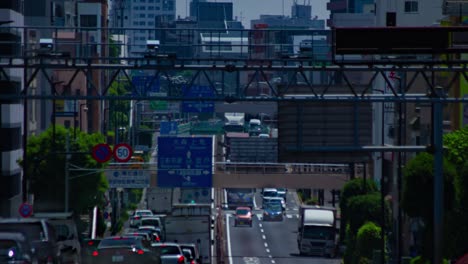 a timelapse of the traffic jam at the urban street in tokyo long shot