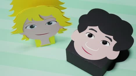 cardboard candy boxes featuring children's faces