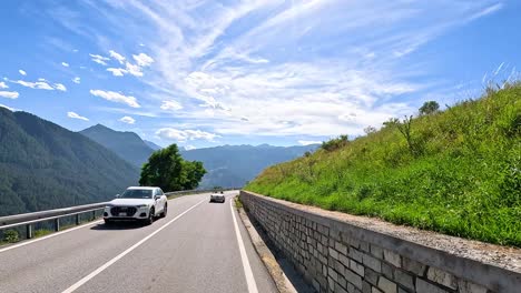 cars driving on a mountain road