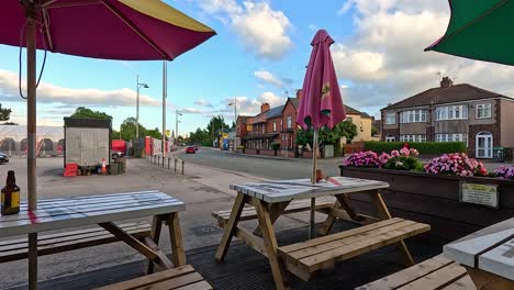 outdoor seating area with street and buildings