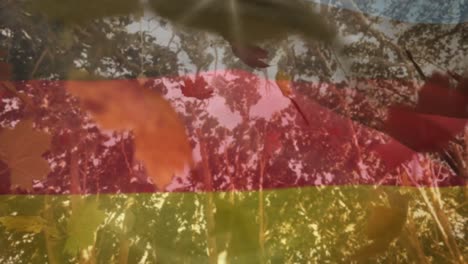 animation of trees and leaves over flag of germany