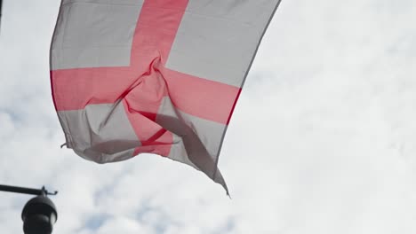 close up shot of england's flag waving in the wind