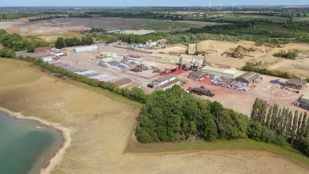 Drone aerial view of warehouses and storage facilities supporting construction industry Rugby England UK