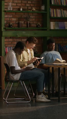 students studying in a library cafe