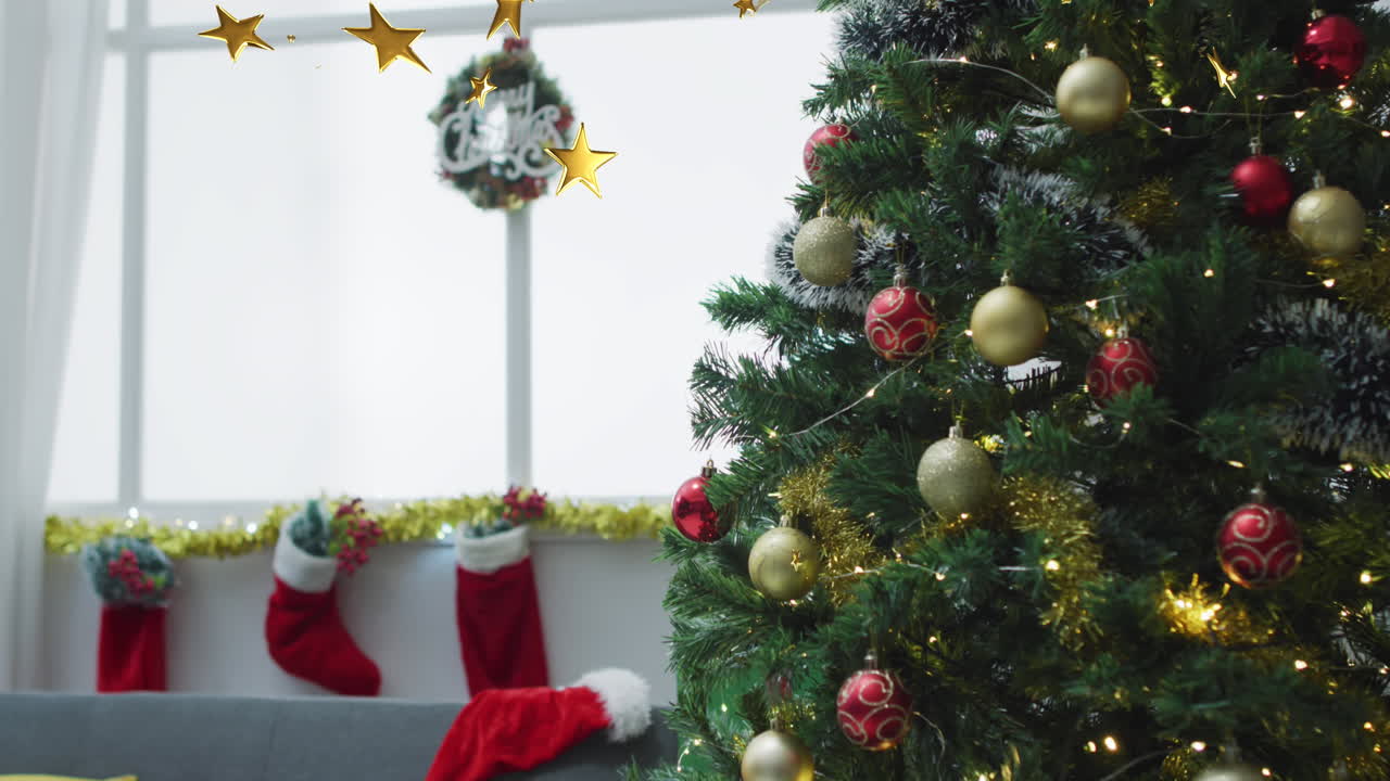 animación de estrellas de navidad cayendo sobre el árbol de navidad