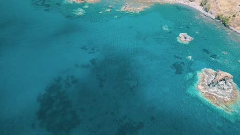 Aerial-shot-of-the-south-coast-of-Crete-with-turquoise-waters-and-beautiful-scenery-1