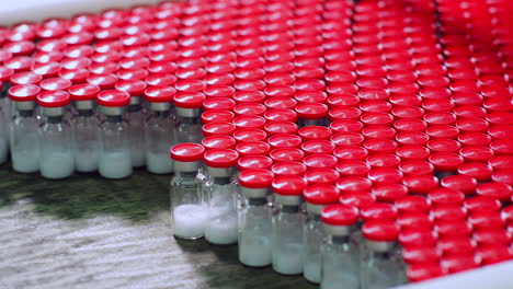 medicine bottles production line at pharmaceutical factory. medical bottles