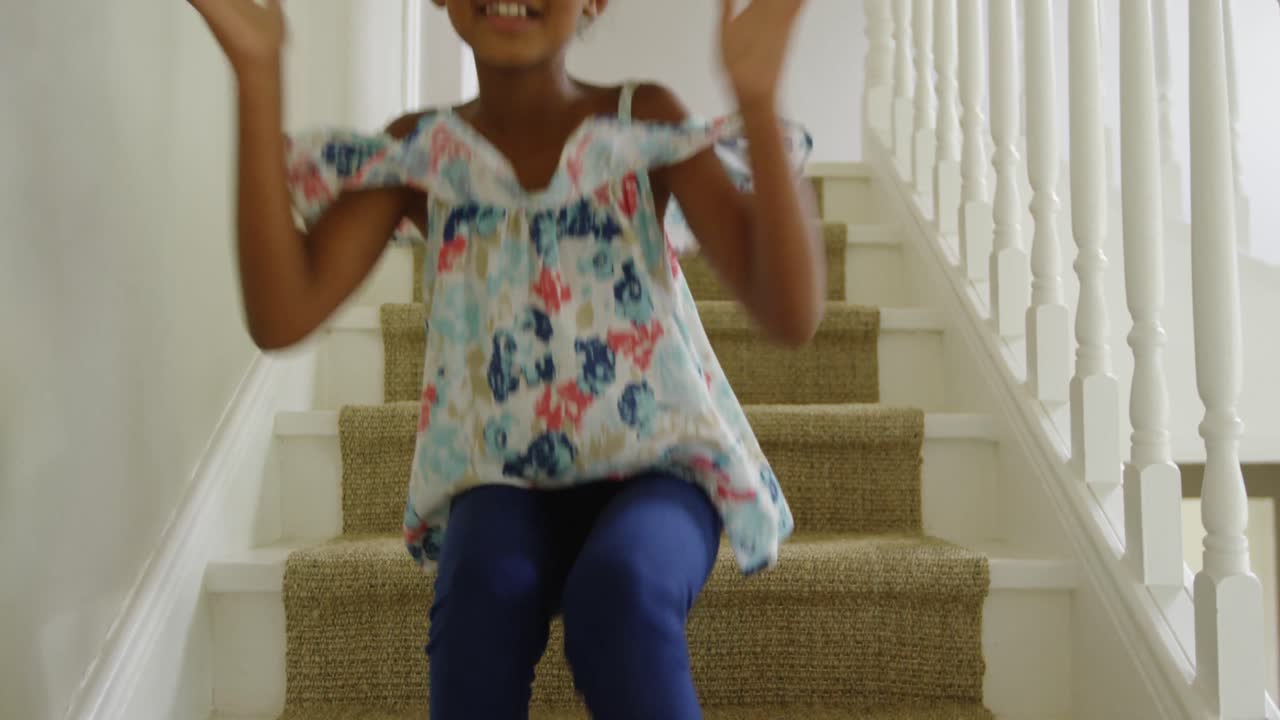 Girl on the stairs at home