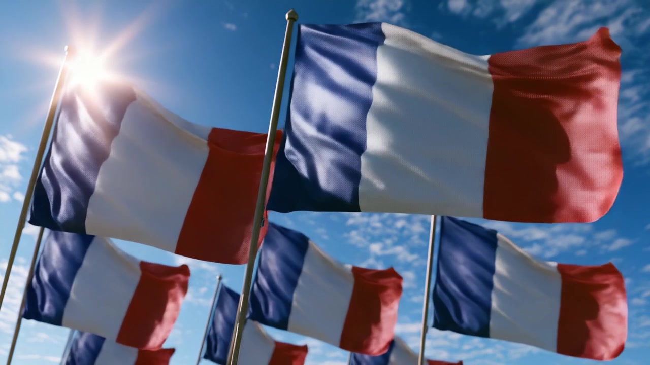 A Symphonic Display of Flags: Capturing the Vibrant Movement of French Flags Fluttering in the Wind Against a Brilliant Blue Sky with Radiant Sunlight