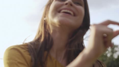 happy woman dancing at music festival