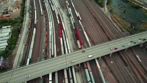 Aerial-over-Chicago-rail-yard,-consist-of-a-complex-network-of-tracks,-switches,-and-various-facilities-for-managing-and-maintaining-freight-trains