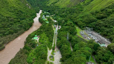 the railway track of machupichu at aguas calientes station crossing jungle and urubamba river