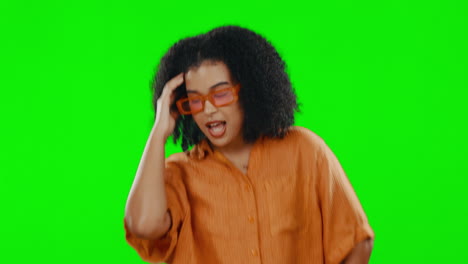 black woman dance in fashion sunglasses on green