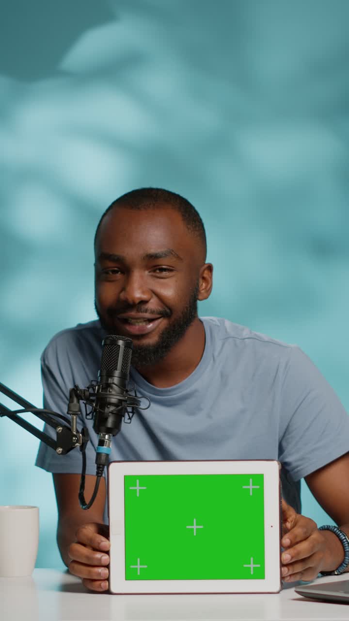 Podcast recording with green screen tablet