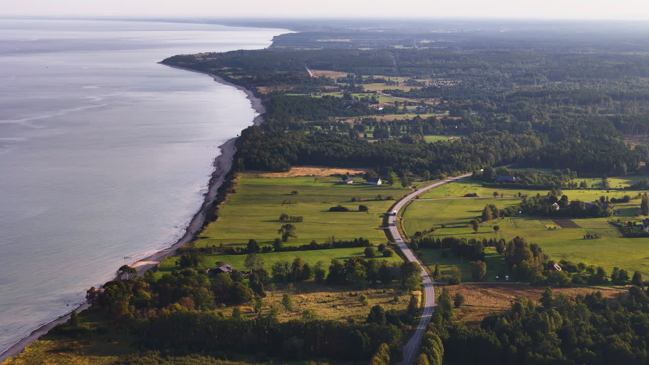 Latvia: Travel, Vacation, And Tourism. Aerial Drone Revealing The Spectacular Seashore Bluffs From Strante To Ulmale, A Scenic Coastal Road Trip Along The Baltic Sea.