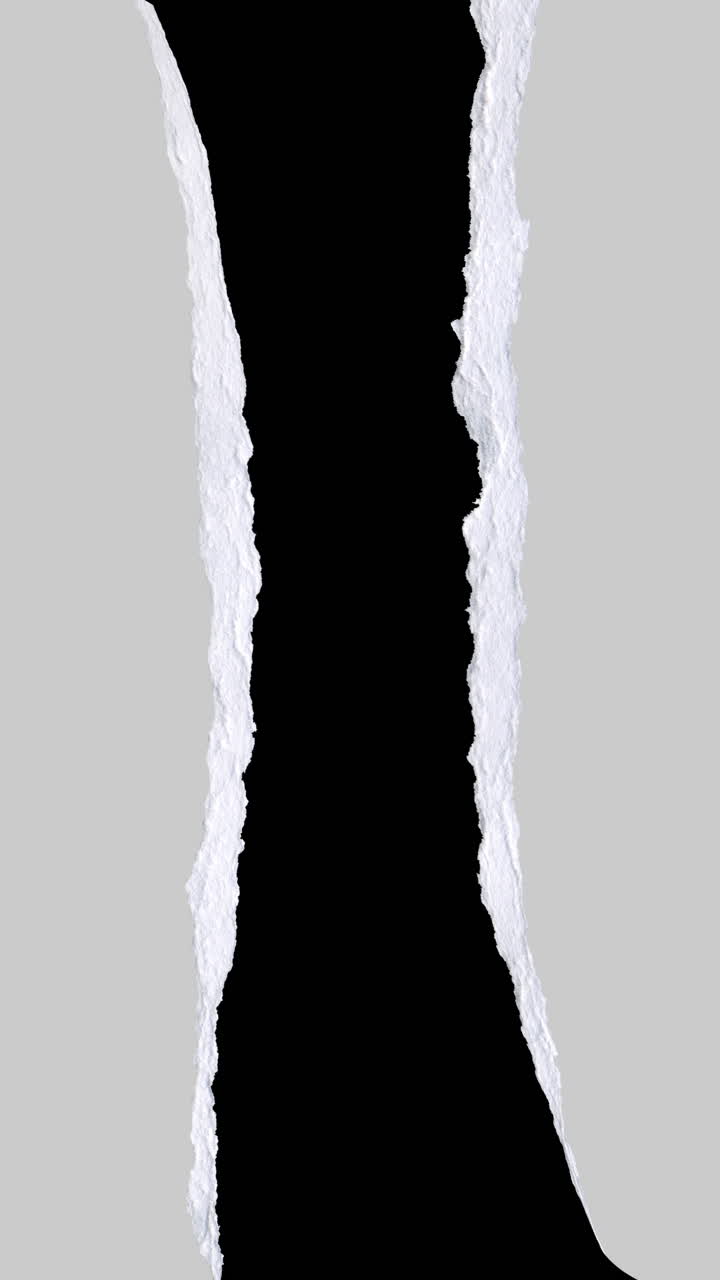Light Gray Paper Tearing Revealing Black Background