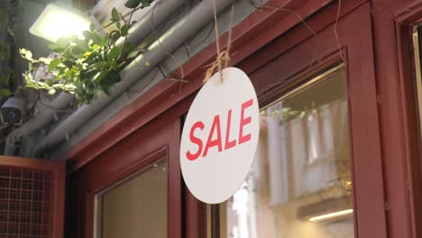 sale sign on shop window