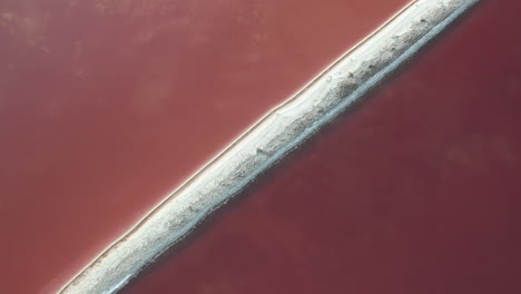 drone aerial view of magical landscape of pink lakes by great salt lake utah usa
