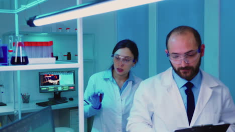 scientists coworkers working in chemical equipped laboratory