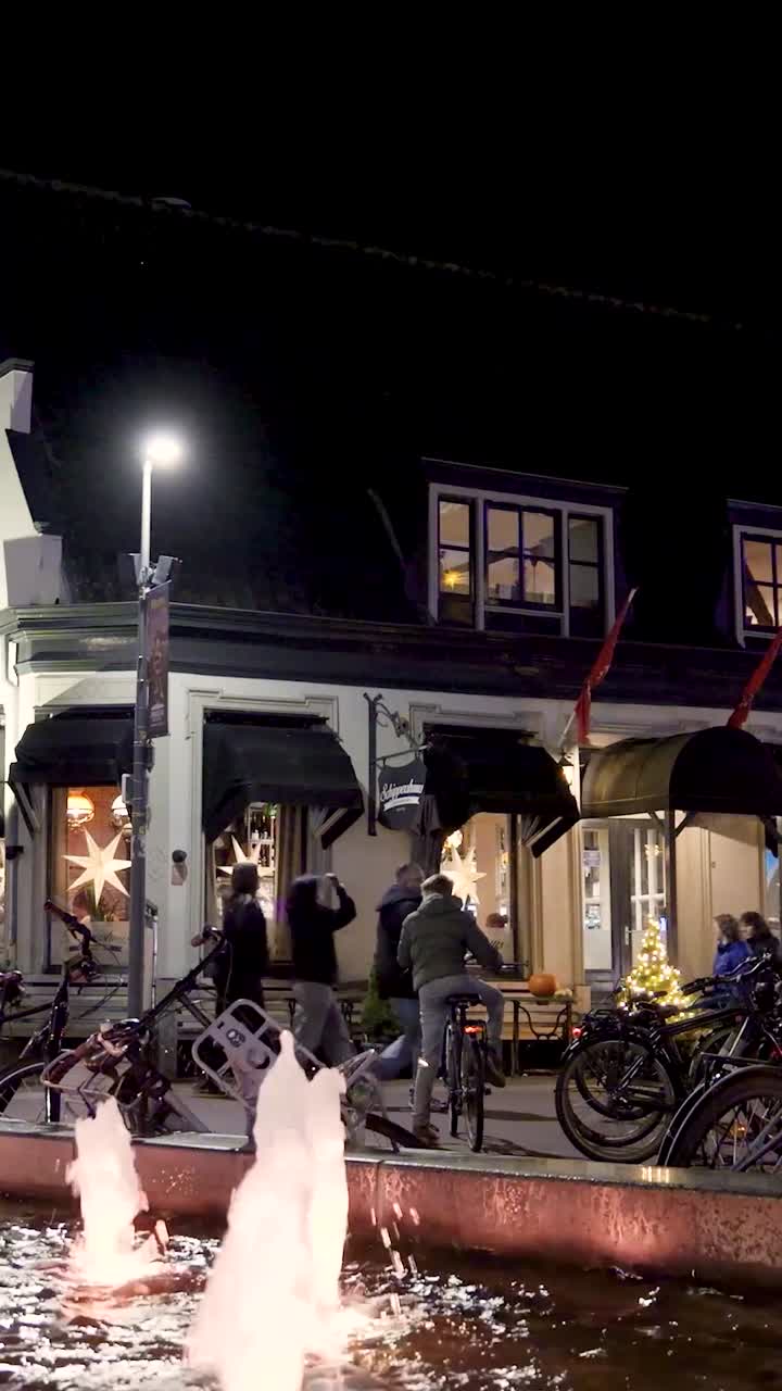 Nighttime City Scene with People and Bicycles
