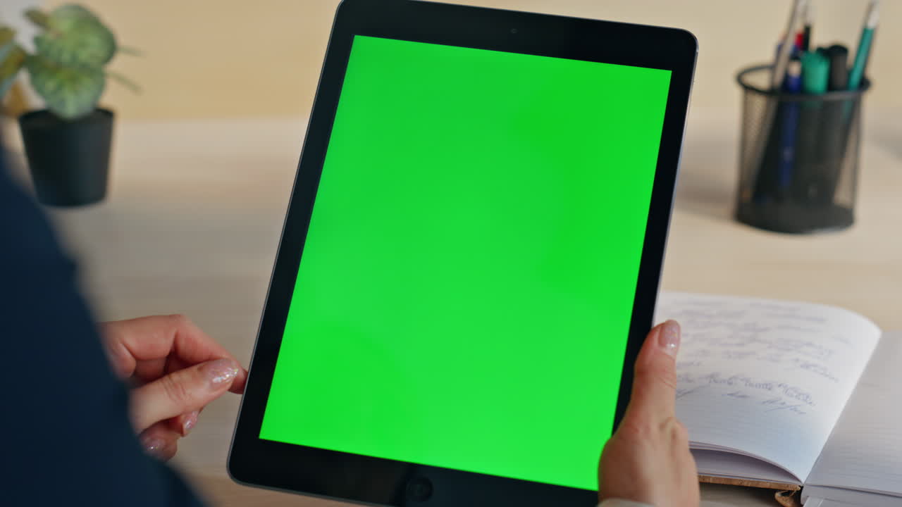 Startuper finger touching chromakey computer table closeup. Woman hand browsing