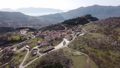 Aerial-landscape-view-of-Pietraroja,-an-italian-hill-top-village,-in-the-Apennines