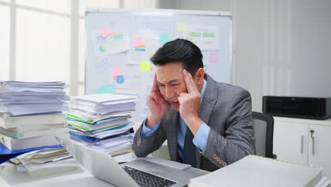 stressed businessman in office