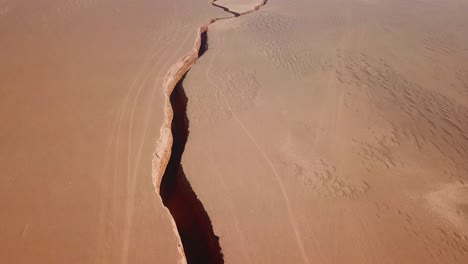 sky-line-in-horizon-desert-scenic-wonderful-landscape-the-geological-twin-fault-on-Earth-snake-tongue-shape-canyon-deep-dark-valley-crack-ground-in-iran-lut-natural-off-road-adventure-Arabian-culture